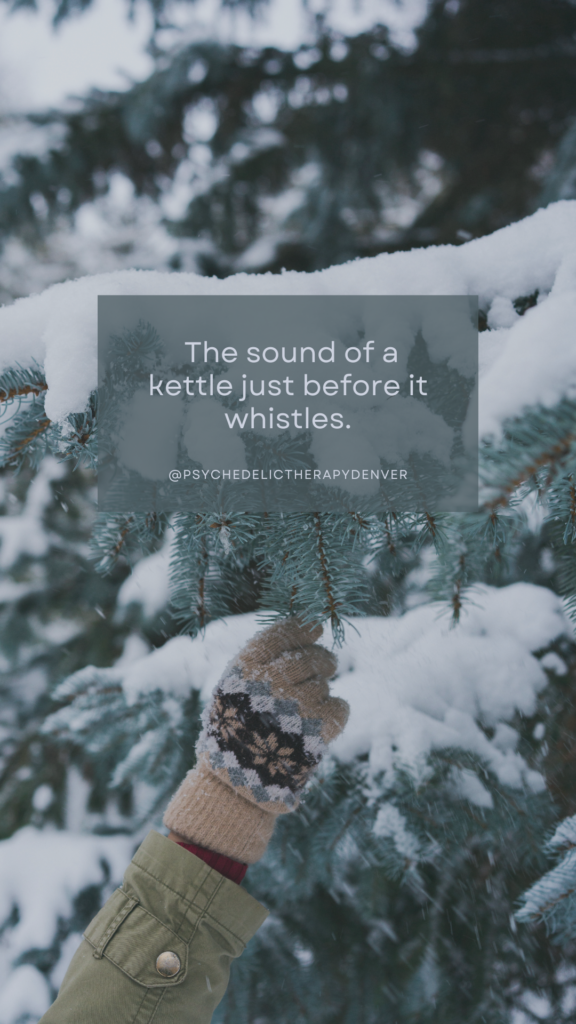 The sound of a kettle just before it whistles.