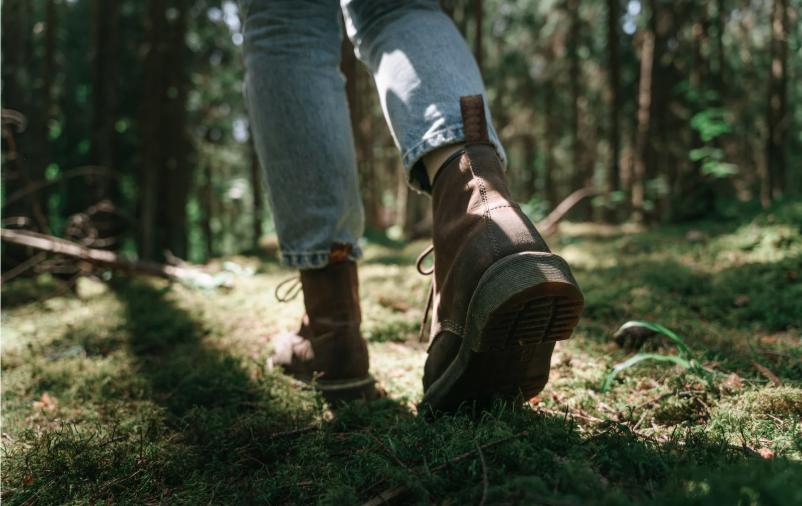 Boots walking through the woods. 