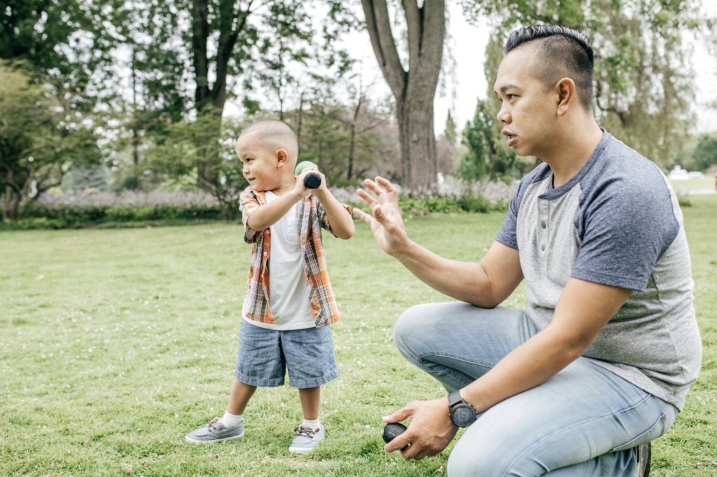 Dad playing with his child