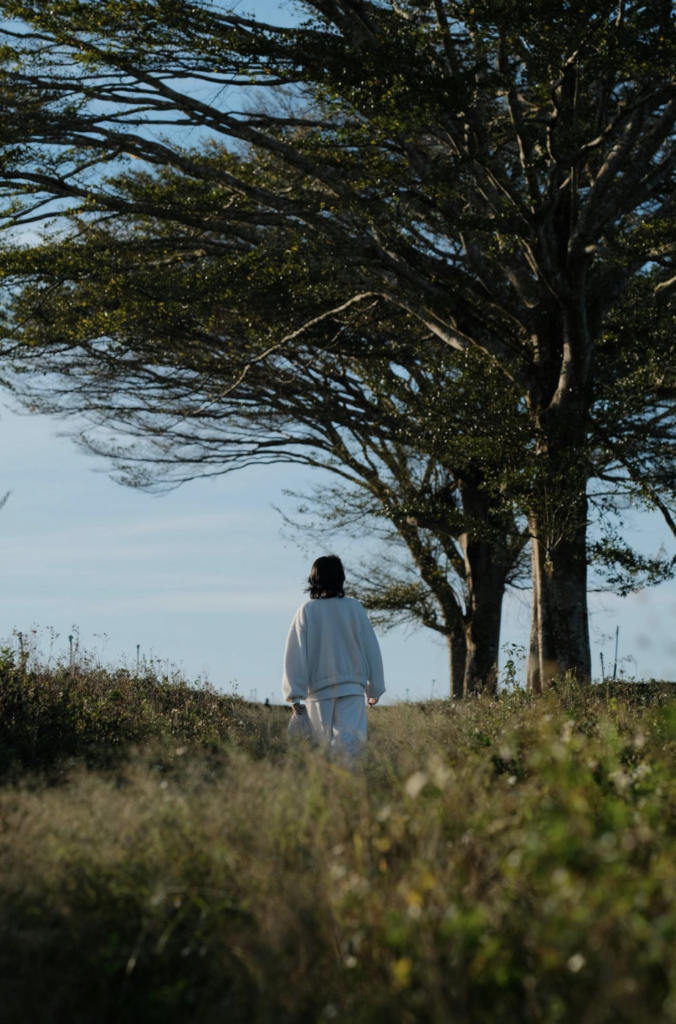 person walking in nature on a mild day